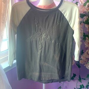 black and teal kid’s shirt